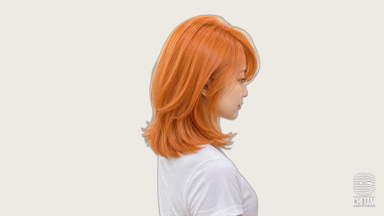 Tóc cam xoài mango layer ngang vai nhìn nghiêng tại Chí Tâm Hair Salon