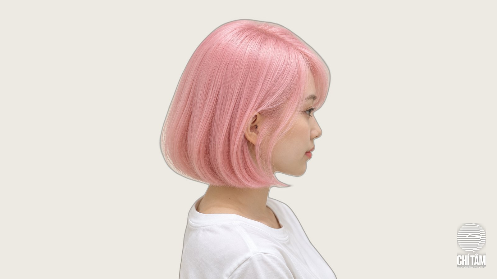 Tóc bob ngắn nhuộm hồng phấn baby pink nhìn nghiêng tại Chí Tâm Hair Salon